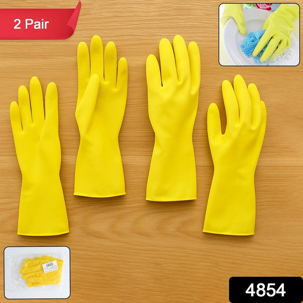 Anti-slip texture on the palm of yellow rubber cleaning gloves for secure grip.
