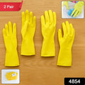Anti-slip texture on the palm of yellow rubber cleaning gloves for secure grip.