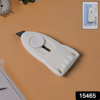 Close-up view of safe retractable blade on Mini Cloud cutter
