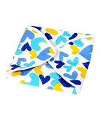 Top-down view of the multi-print square roti cover on a kitchen counter.