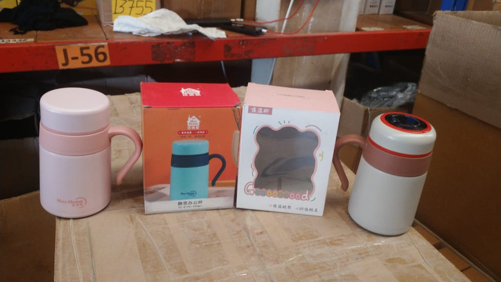 Own Hydrate 550ML insulated steel mug placed on a wooden table, ready for use