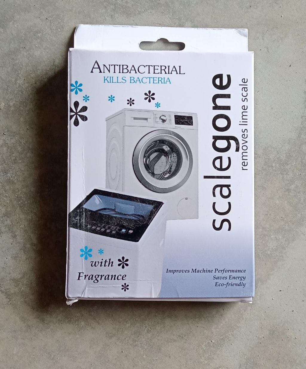 Storenzo Washing Machine Descaler powder removing stubborn limescale from the tub.