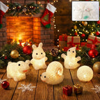 Decorative animal night light casting a gentle, warm LED glow on a bedside table.