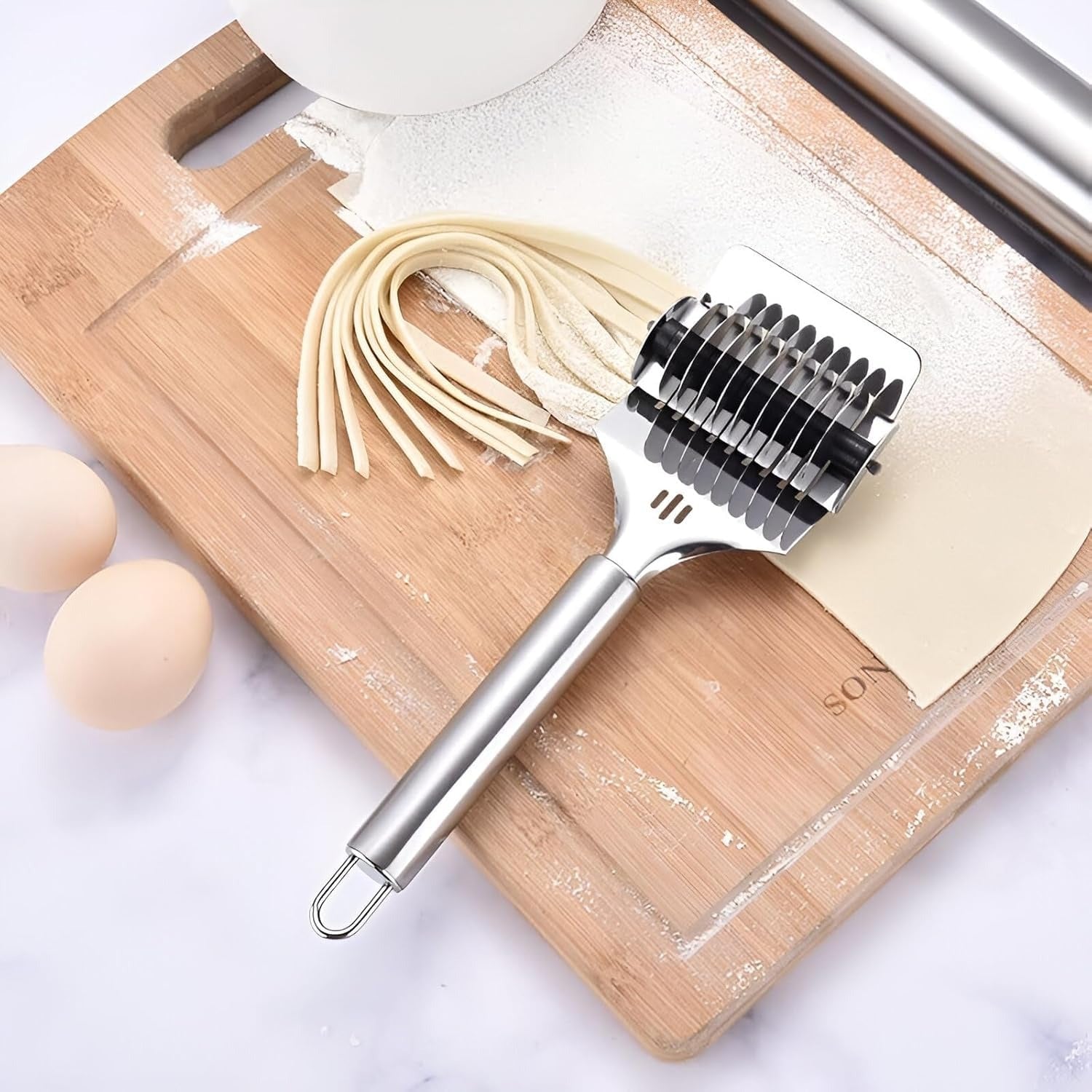 Product shot of manual multi-blade dough cutter roller