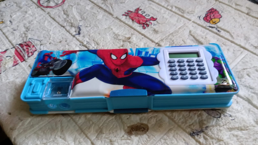 Detailed view of the kids' stationery box with multiple compartments and a calculator.