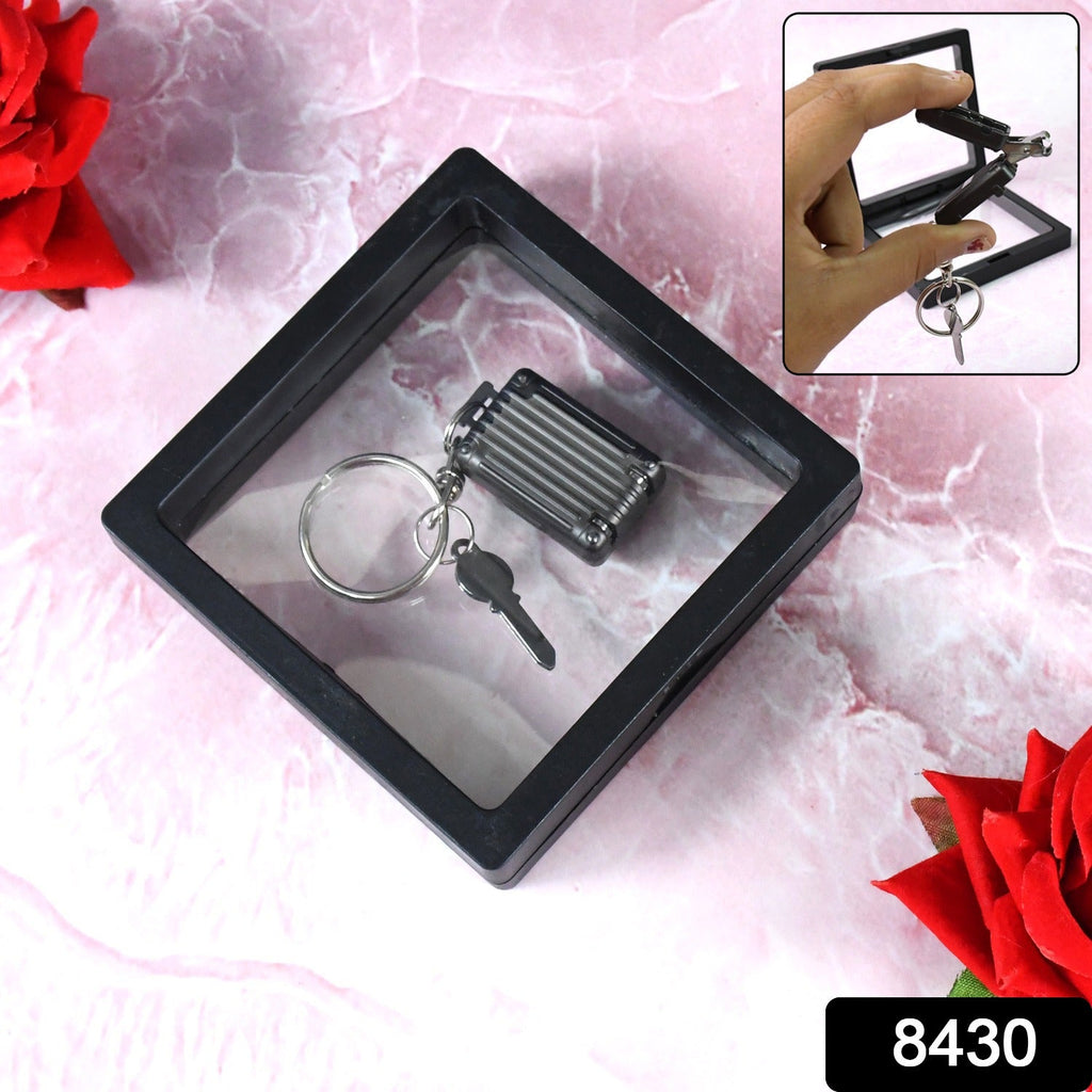 Suitcase shaped portable nail clipper keychain in compact design