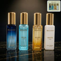 Luxury fragrance gift set featuring four unisex perfumes with elegant bottles