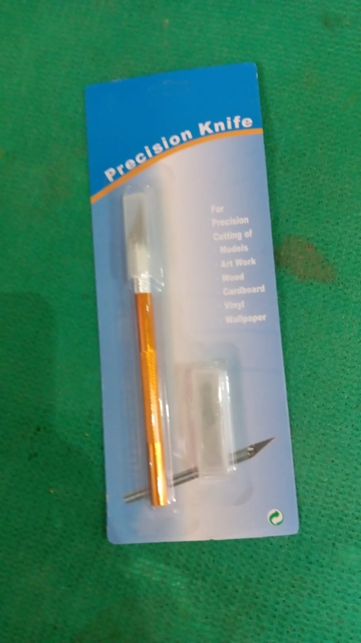 Close-up of the durable aluminum alloy handle of the precision craft knife, showcasing quality
