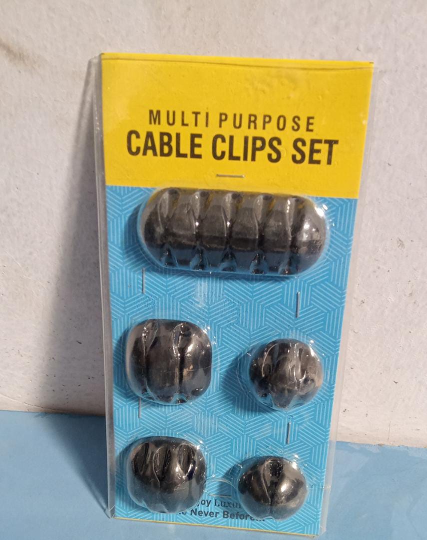 Multi-purpose wire holder in black, ideal for home and office cable solutions.