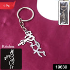 Close-up of spiritual Krishna flute shaped metal keyring