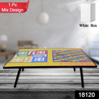 Child using a portable Foldable Study Table for playing Ludo.