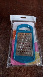 Supermom cheese and vegetable grater placed neatly on kitchen countertop