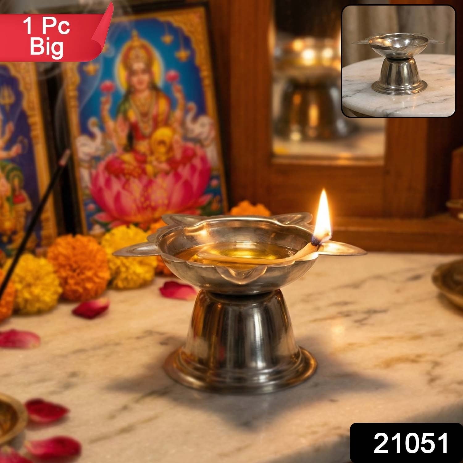 Shiny stainless steel pooja diya stand with sunflower design
