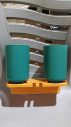 Another view of the wall mount toothbrush holder with cups, showcasing its compact and functional design.