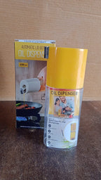 Automatic oil dispenser bottle placed in modern kitchen setting