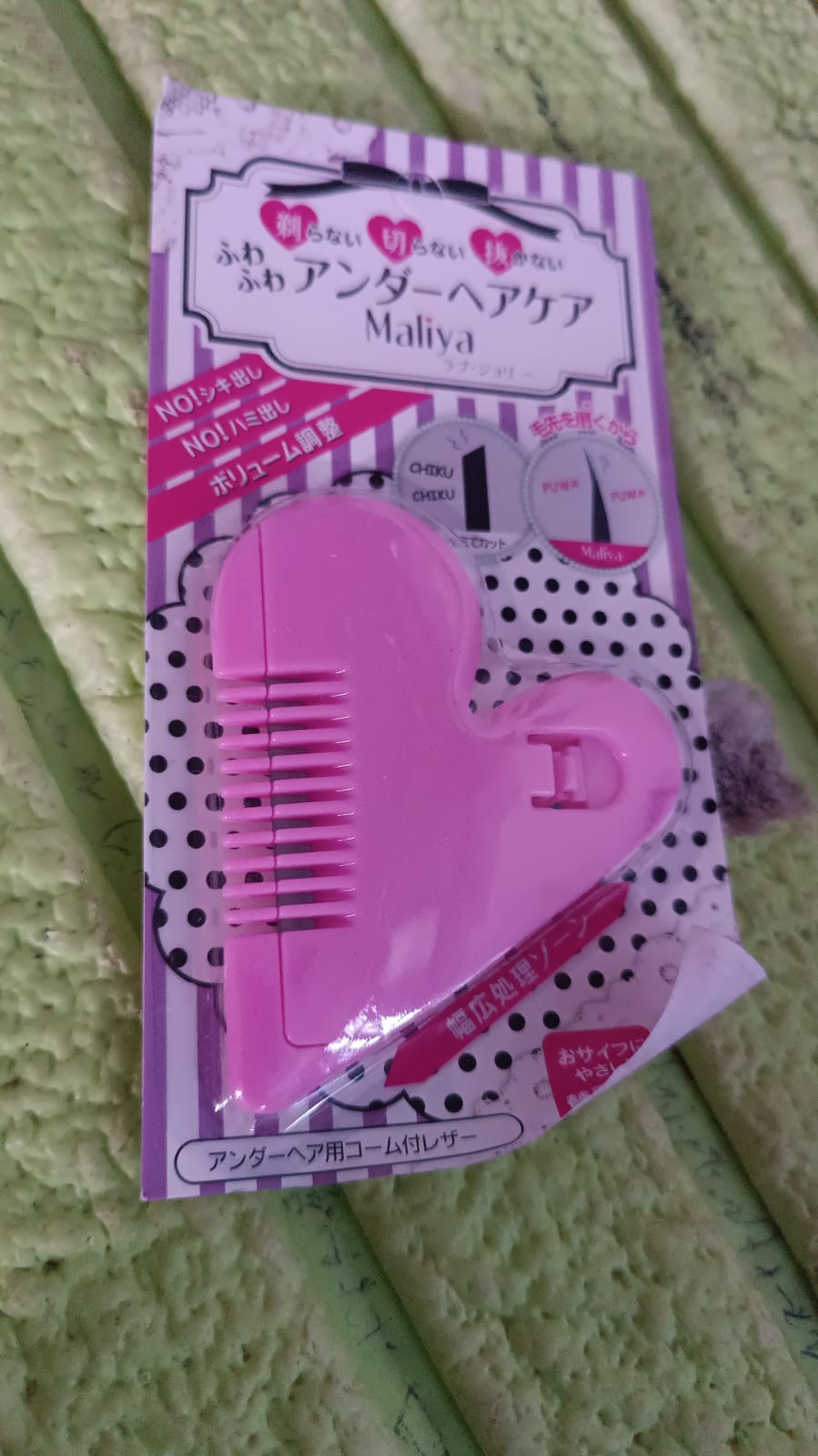 Scissors in user's hand for scale