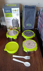 Ganesh Stainless Steel Tiffin Lunch Box fitting perfectly inside a modern lunch bag.