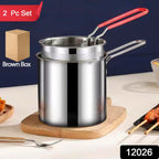 Compact stainless steel deep frying pot and detachable strainer basket set on a kitchen counter.
