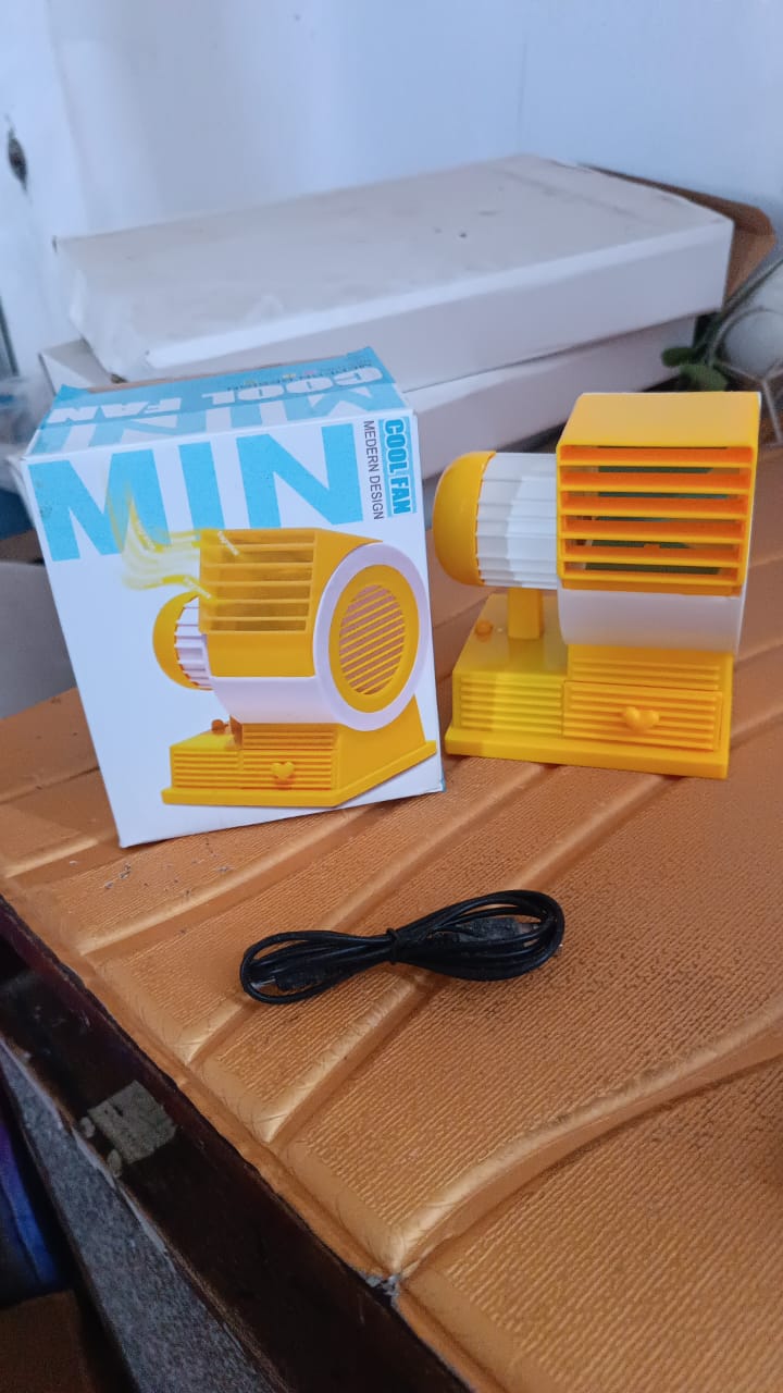 Compact mini USB fan ideal for travel and small spaces