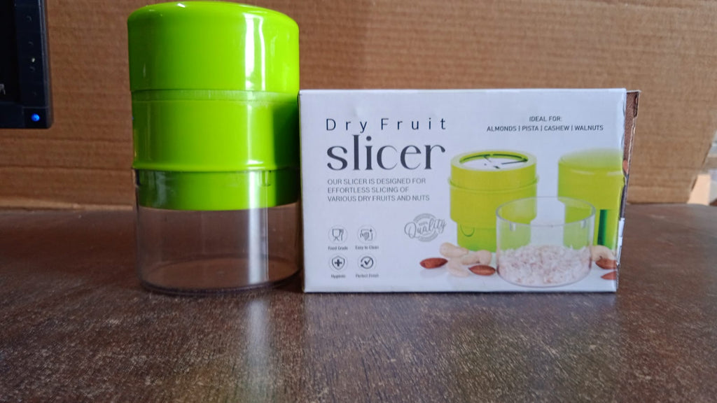 Efficient Konvex dry fruit and nut slicer with a clear storage container.