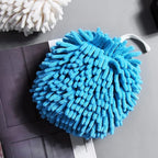 Microfiber duster mitt showing comfortable hand fit
