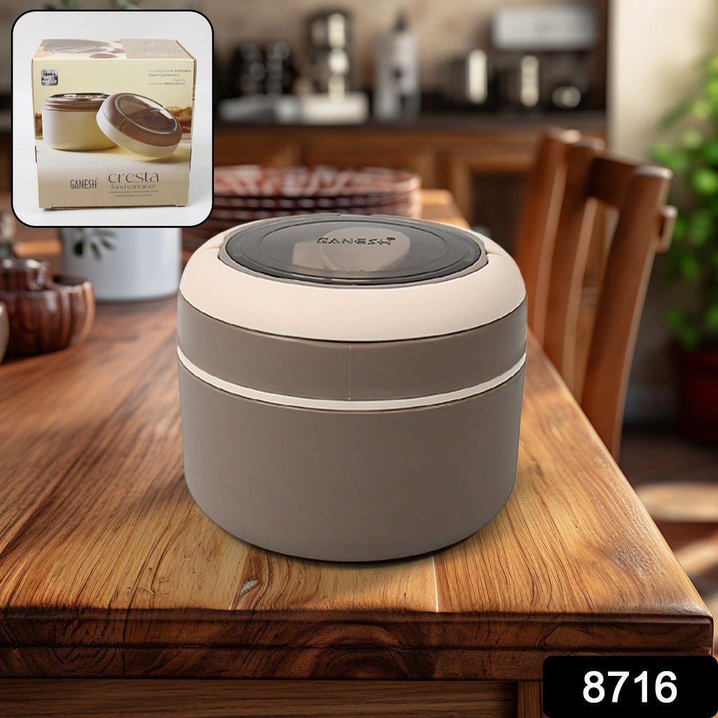 A user holding the compact leak-proof tiffin, showcasing its portable design.