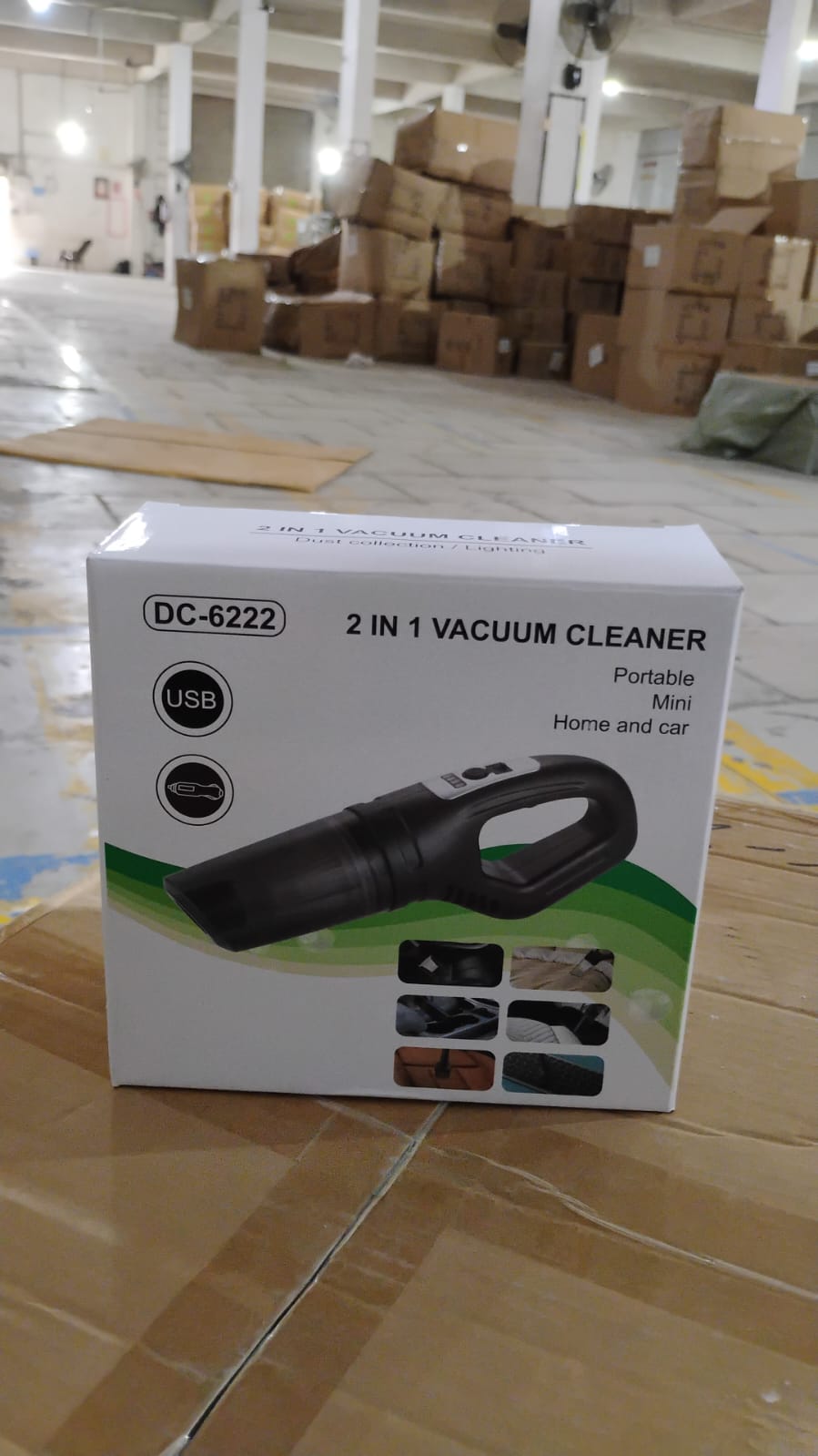 Velvet Wheels portable vacuum cleaner highlighting its compact size and accessories.