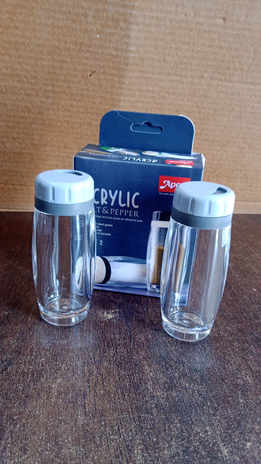 Lifestyle image of Apex acrylic salt and pepper shakers on a dining table enhancing meal experience