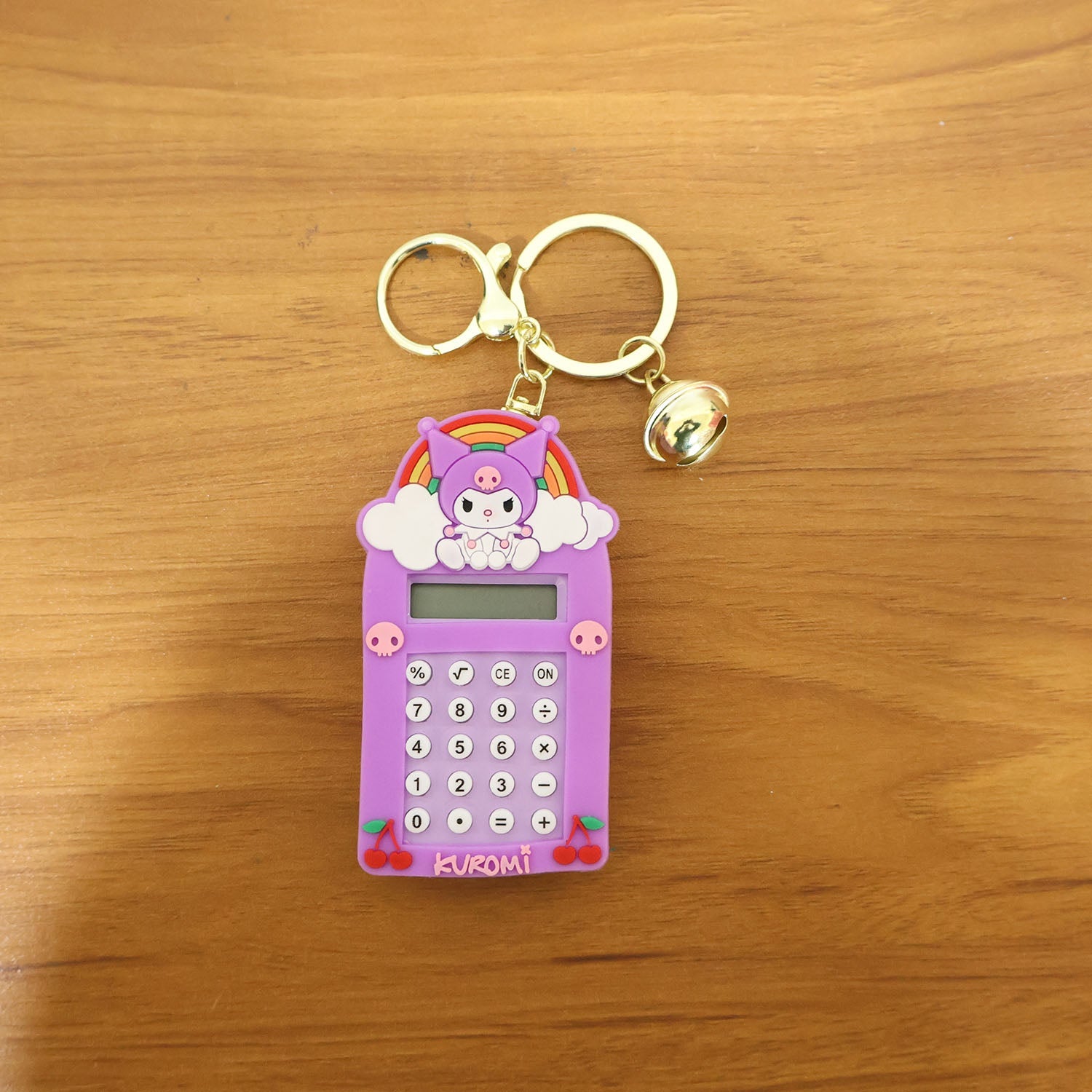 Kuromi calculator keychain used outdoors as portable calculation tool