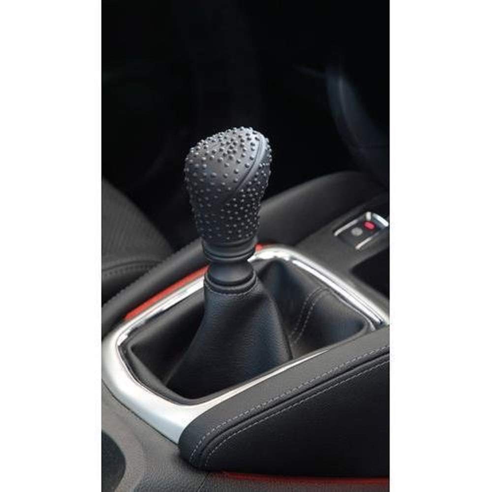 Protective gear shift knob cover in a car, showing its snug fit.