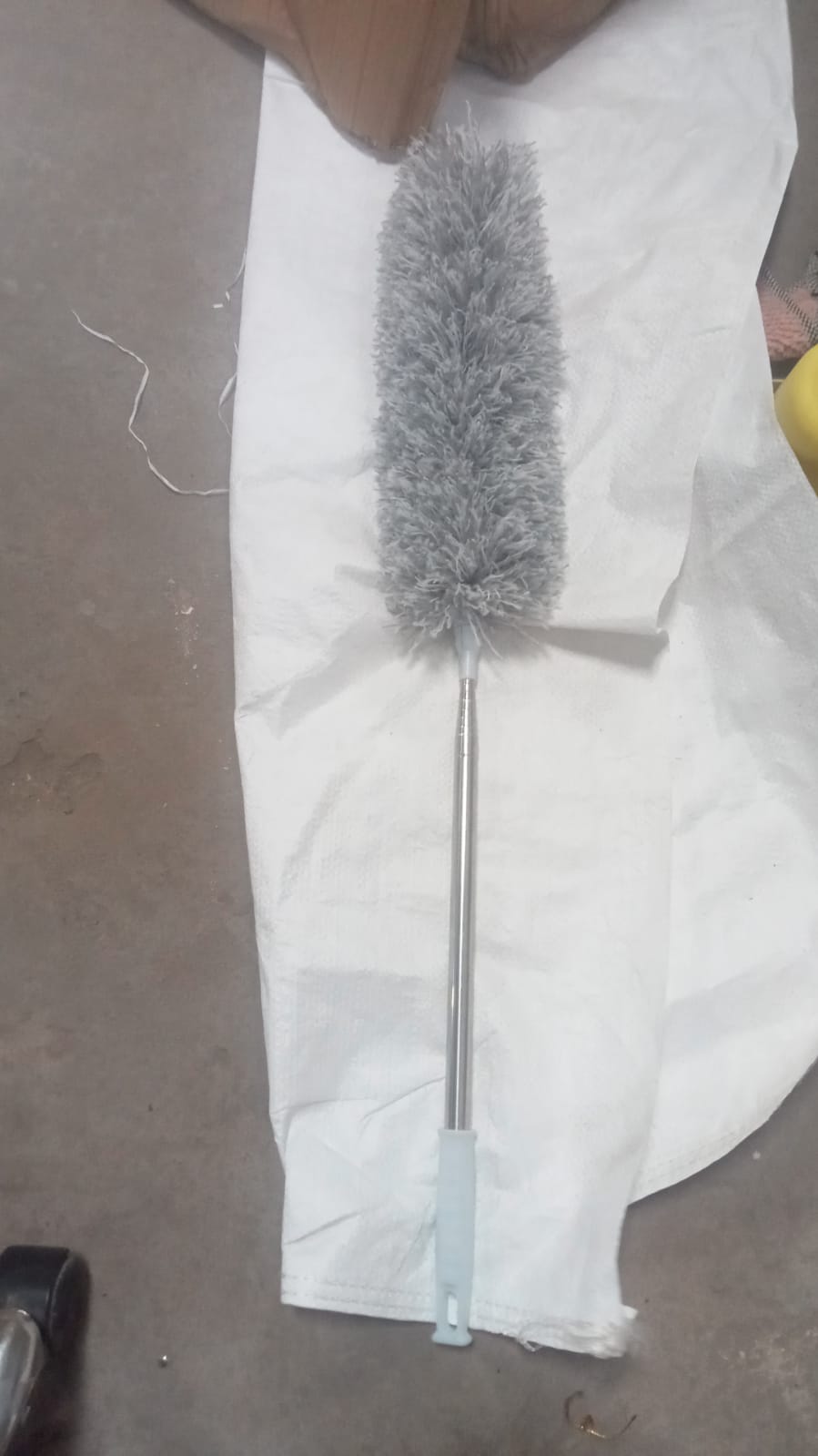 Compact storage solution for the extendable microfiber duster.