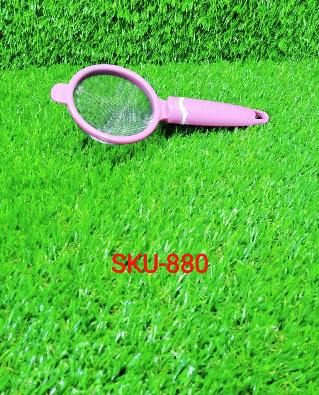 Close-up of the fine mesh filter on the Siplix plastic chai chalni.