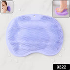 Purple silicone bath mat with exfoliating bristles and anti-slip suction cups on floor
