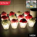 Close-up of rose shaped decorative flameless LED candle in textured glass holder