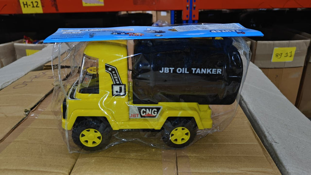 Close-up of the toy truck's wheels and chassis, emphasizing its heavy-duty construction.