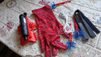 An action shot shows Web Shooter Toy projectiles successfully sticking to a wall.