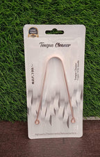 Velvet Wellness Copper Tongue Cleaner shown with its sustainable packaging.