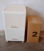 Empty 2-layer plastic wardrobe drawers ready for home organization.
