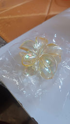 Side view of durable plastic hair clamp with simple design
