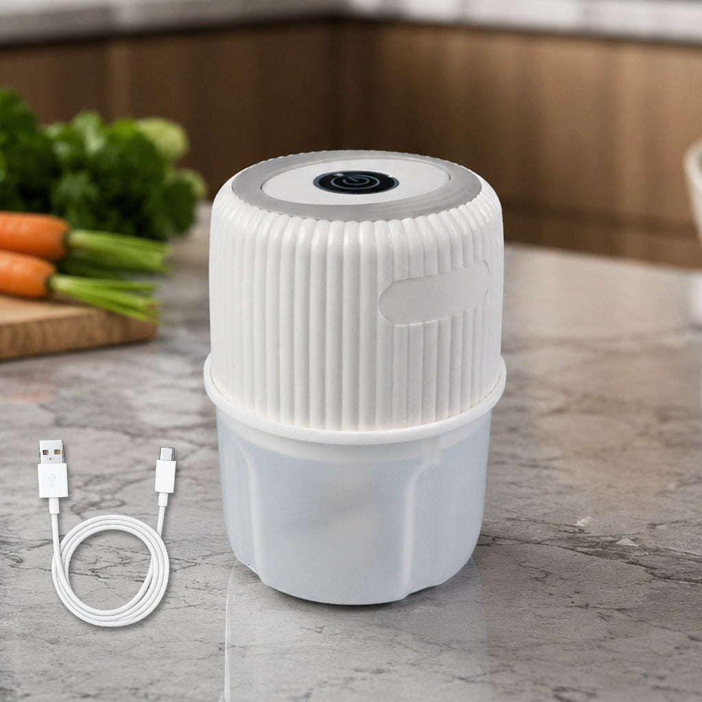 Garlic chopper on kitchen counter with USB cable