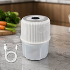 Garlic chopper on kitchen counter with USB cable