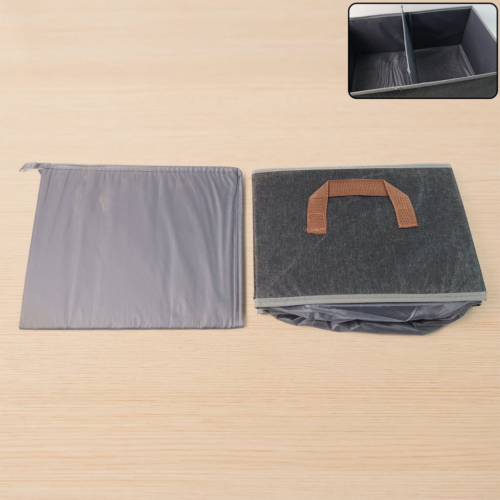 Storage box with handles filled with clothes for easy portability and organization