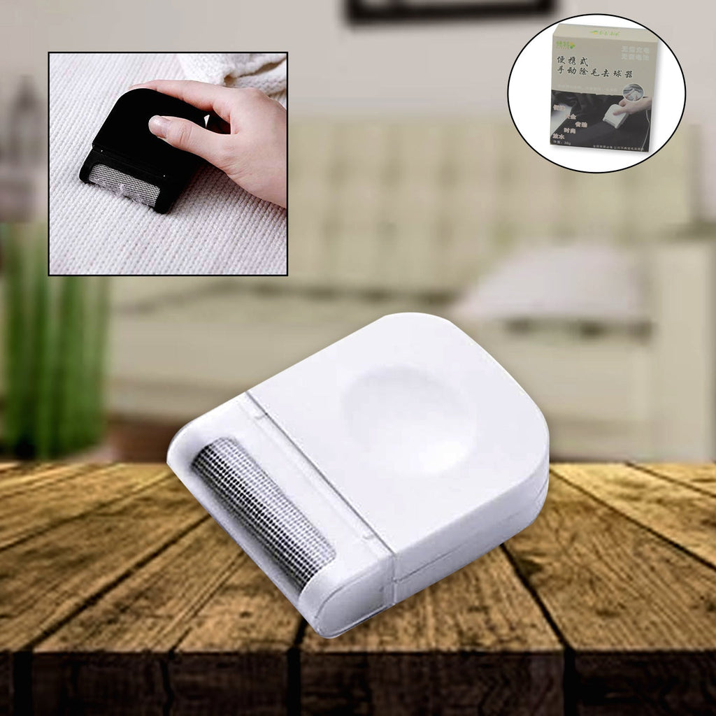 Waggy Tales portable lint remover displayed with its packaging.