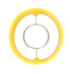 Handheld corn kernel peeler demonstrating how it separates kernels from the cob.