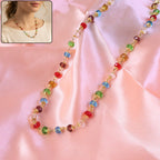 Multicolour crystal beaded necklace with gold-tone links sparkling elegantly