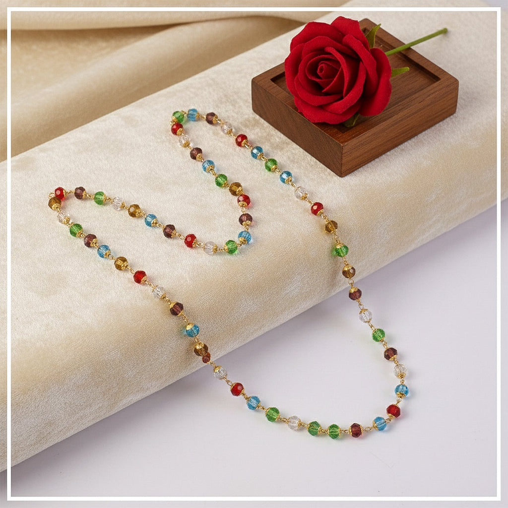 Gold-tone linked necklace featuring multicolour crystal beads