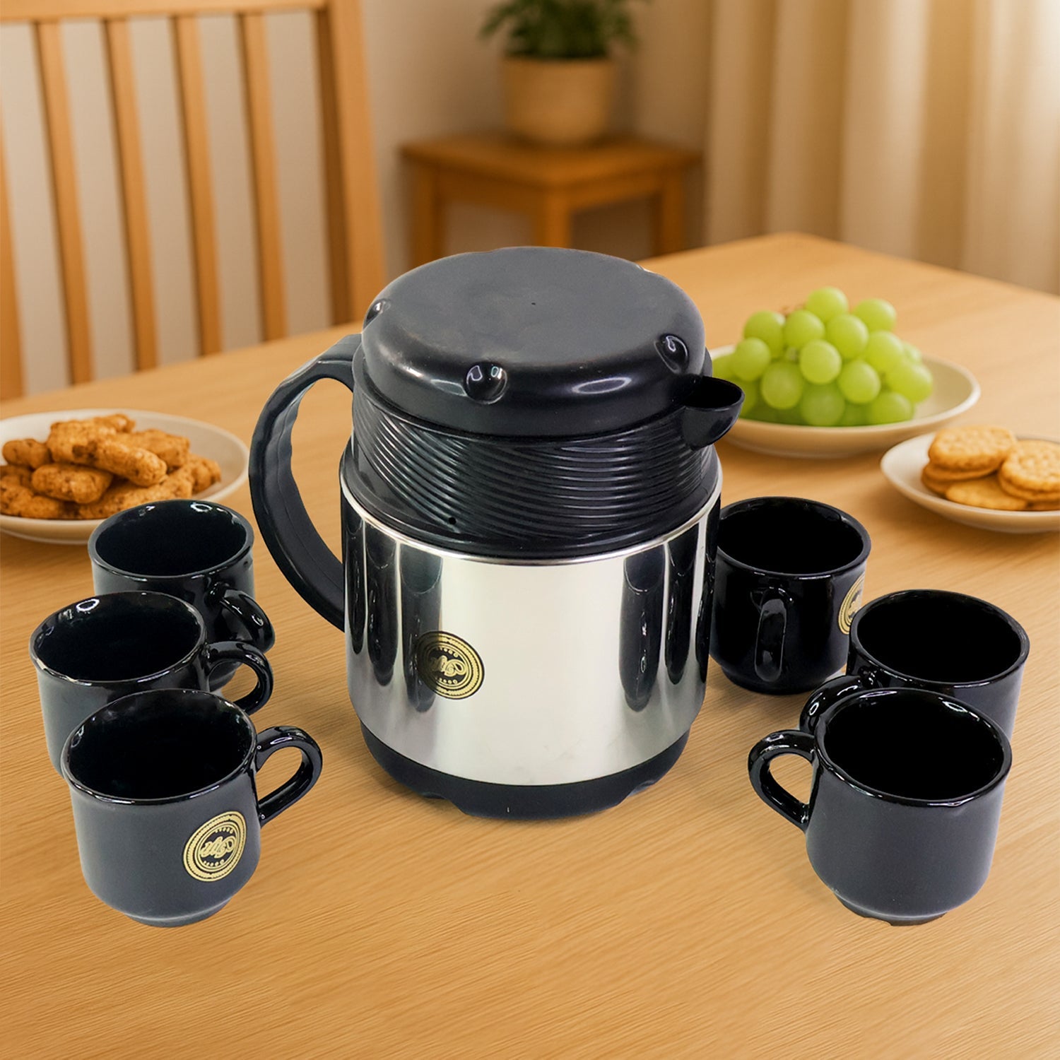 Tea and coffee serving set featuring an insulated thermos flask and ceramic cups