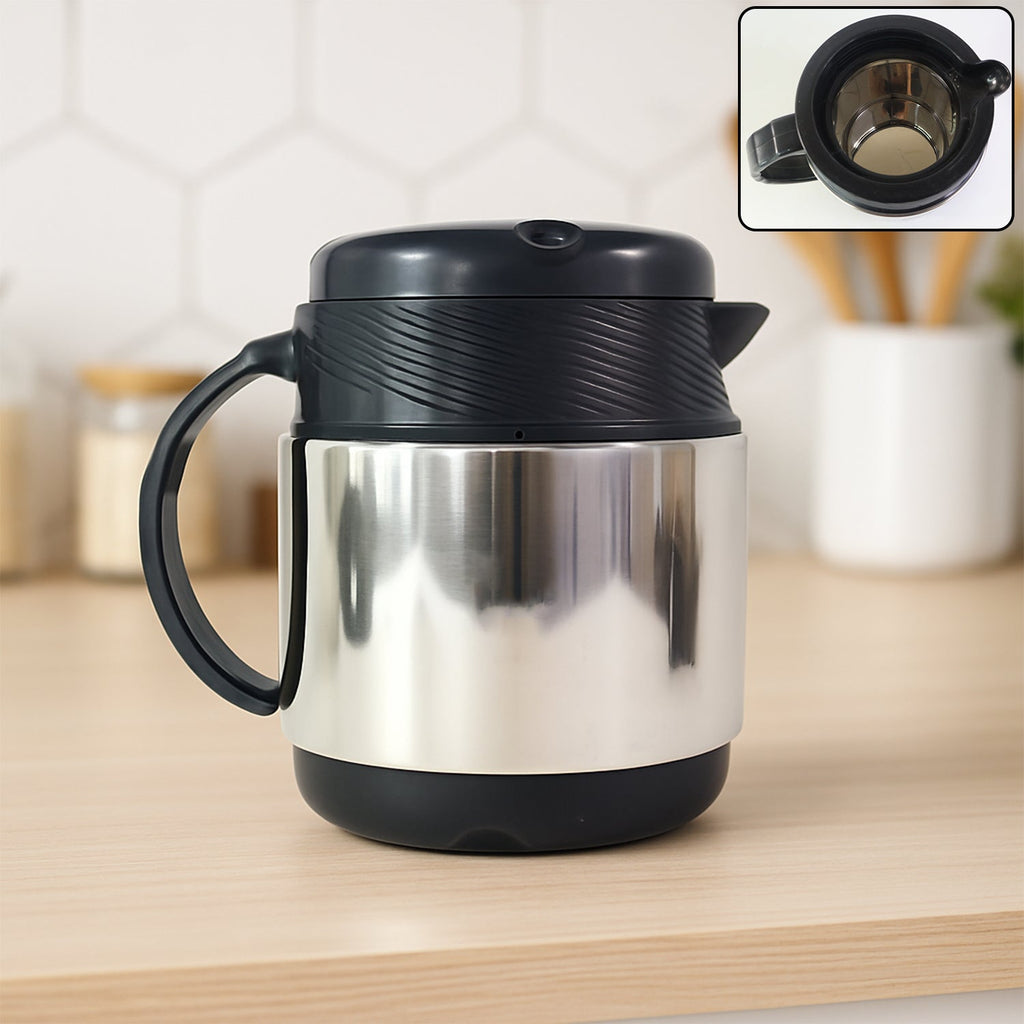 Side view of insulated thermos flask accompanied by ceramic cups for tea and coffee