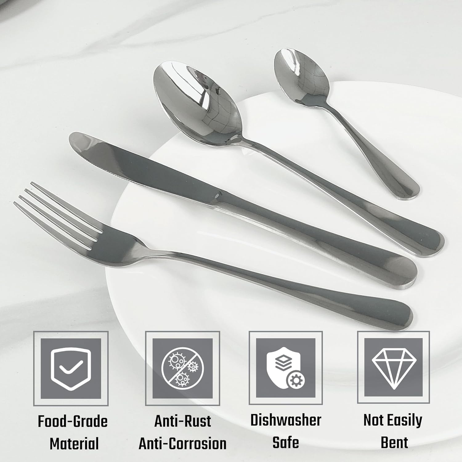 Elegant dining table arrangement with polished stainless steel cutlery