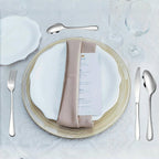 Detailed close-up of stainless steel fork and spoon from cutlery set